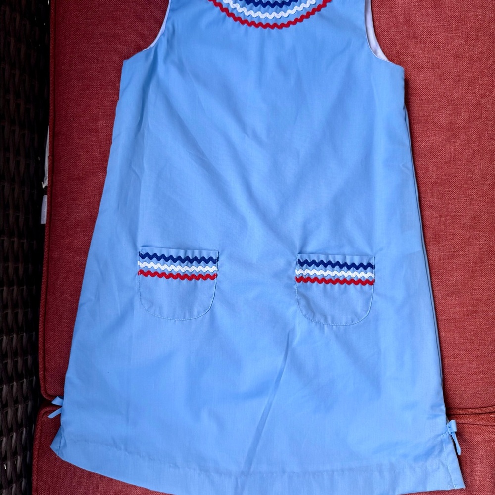 Blue Sleeveless Dress with Red and White Accents